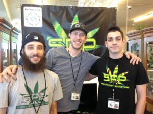 (Brian Lade, center, and crew at a visit to Main Street Marijuana)