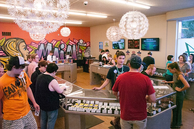 Main Street Marijuana on a busy night as customers celebrate the first day of legal possession in Oregon on July 1.