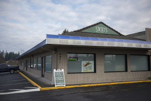 Sticky's Pot Shop opened along Highway 99 in Hazel Dell late last month, defying Clark County code that prohibits recreational marijuana shops in unincorporated areas. Clark County code enforcement officials say they'll be issuing a warning to the store in the coming days. (Amanda Cowan/The Columbian)