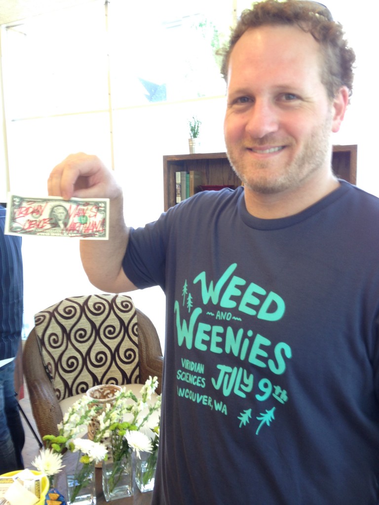 (Justin Dufour, Viridian Sciences, is Main Street Marijuana's first customer)